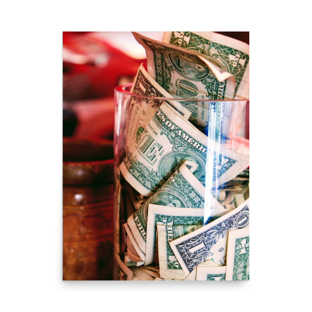 Dollar bills in a jar