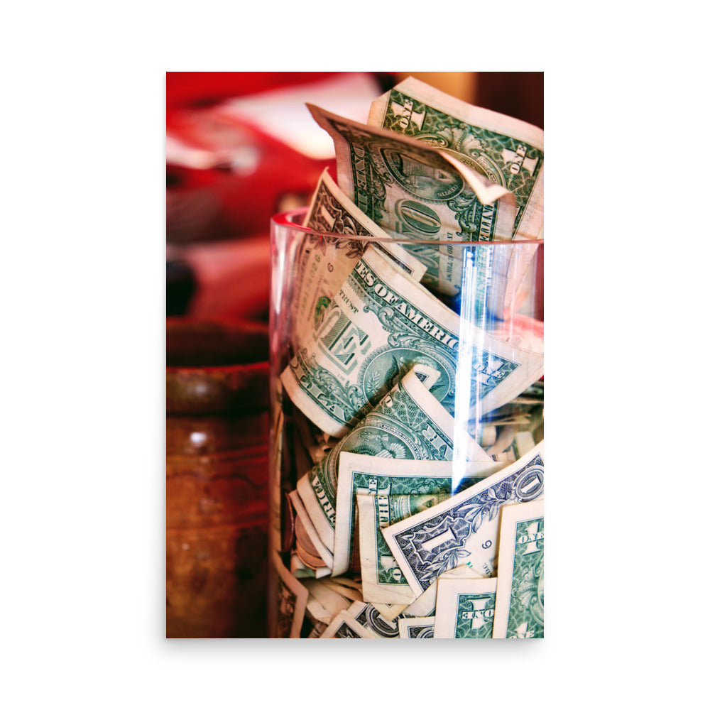 Dollar bills in a jar